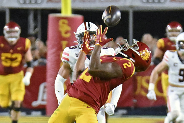 Receiver Brenden Rice of USC makes a over the shoulder catch against Arizona last Saturday. PHOTO BY GEORGE LAASE