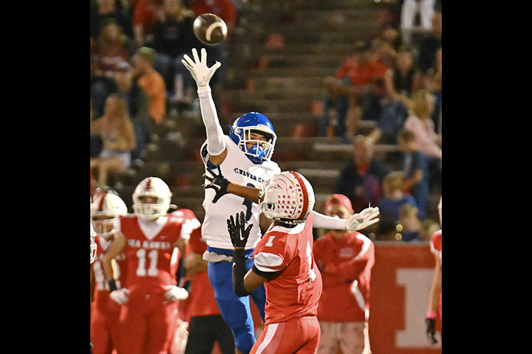 Culver City safety James Wright leaps high to try block a pass by Redondo Union's Cadence Turner during the Centaurs 27-14 win over the Sea Hawks last Friday at Redondo. PHOTO BY GEORGE LAASE Culver City safety James Wright leaps high to try block a pass by Redondo Union's Cadence Turner during the Centaurs 27-14 win over the Sea Hawks last Friday at Redondo. PHOTO BY GEORGE LAASE